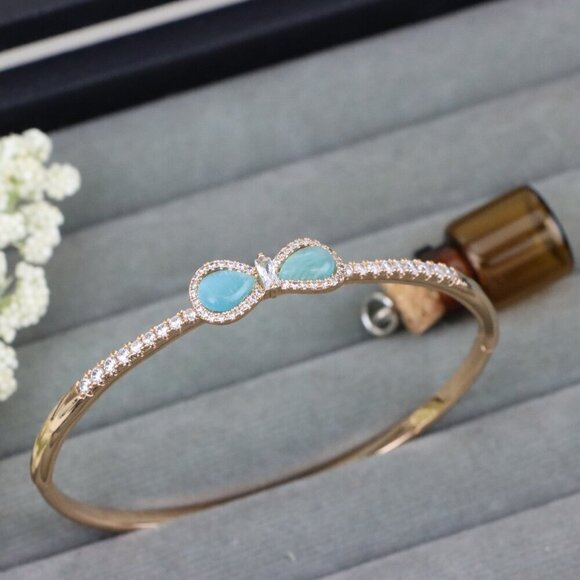 Elegant Rose Gold Bangle with Aqua Bow and Crystal Accents, XPBL0423 - Picture 1 of 12